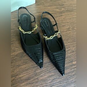 Open edit, black pointy toed sling flats with gold accents.  Size 11